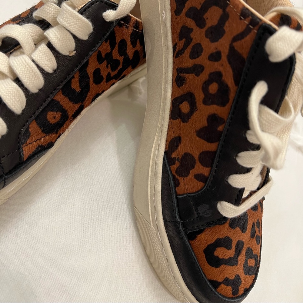 New. Sporty brown/black leopard leather sneaker. Reasonable offers are welcomed.